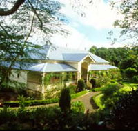 The Falls Rainforest Cottages - ACT Tourism