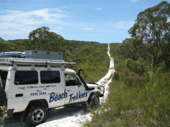 Beach trekkers North Stradbroke Island - ACT Tourism