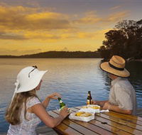 Kayaking on Tuross Lake - ACT Tourism