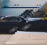 Arrival Private Transfers Brisbane Airport BNE to Brisbane in Business Car - ACT Tourism