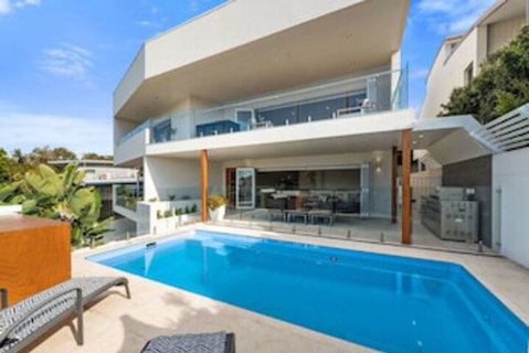 Ultimate Beach House - ACT Tourism 0