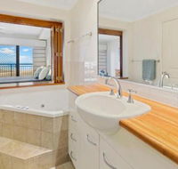 Luxury Beach Unit Dolphin Heads - ACT Tourism