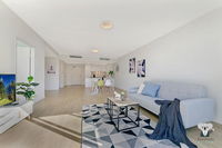 KOZYGURU NORTH RYDE MACQUARIE PARK 2 BEDROOM APT  FREE PARKING NNR009