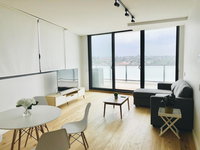 Modern Designer 2BR Apartment Near Airport  Beach