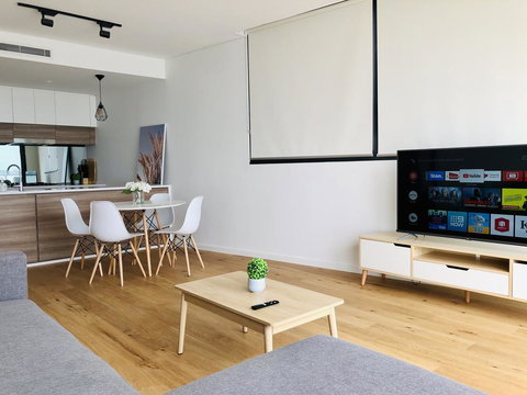Modern Designer 2BR Apartment Near Airport & Beach - ACT Tourism 2