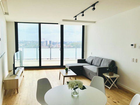 Modern Designer 2BR Apartment Near Airport & Beach - ACT Tourism 1