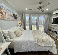 STYLISH UNIT - CLOSE TO DREAMWORLD - ACT Tourism