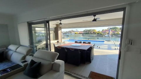 Relax Poolside By The Canal - ACT Tourism 0